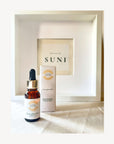 Forest Glow Elixir Bakuchiol Gesichtsöl von Skincare by Suni mit Produktflasche und Verpackung